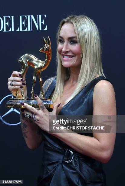 German singer Sarah Connor poses with her Bambi award in the 'National Music' category during the Bambi media prize ceremony on November 21, 2019 at...