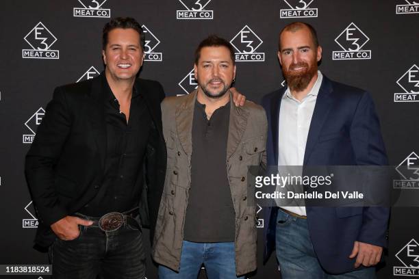 Luke Bryan, Jason Aldean, and Adam LaRoche attend the grand opening of E3 Chophouse Nashville on November 20, 2019 in Nashville, Tennessee.