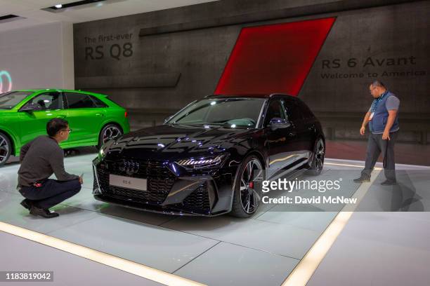 People look at the Audi RS6 Avant at AutoMobility LA on November 21, 2019 in Los Angeles, California. The four-day press and trade event precedes the...
