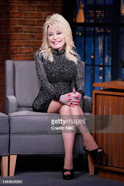 Episode 918 -- Pictured: Singer Dolly Parton during an interview with host Seth Meyers on November 21, 2019 --