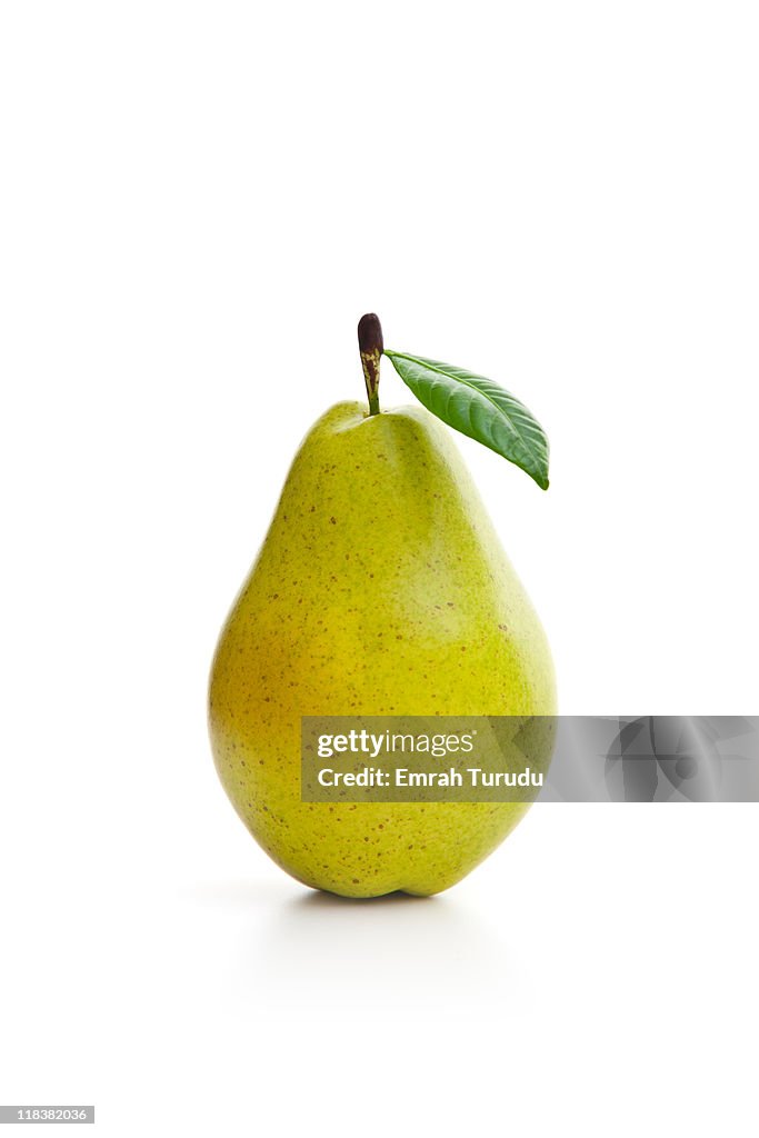 Green pear on the white background