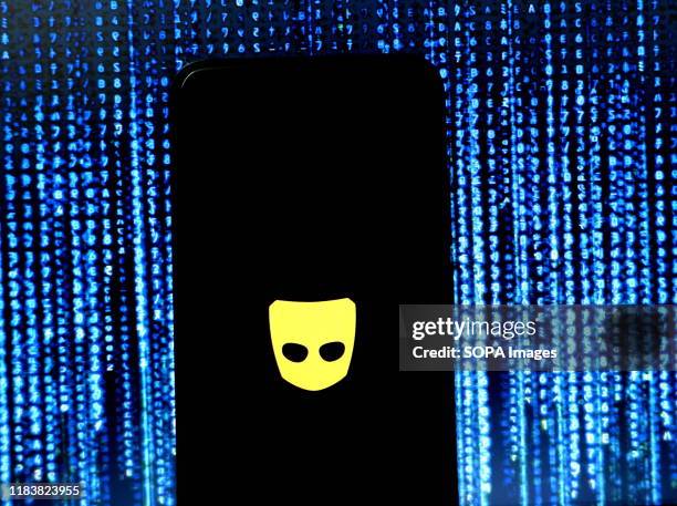 In this photo illustration the world's largest social networking application for gay community Grindr logo seen displayed on a smartphone.