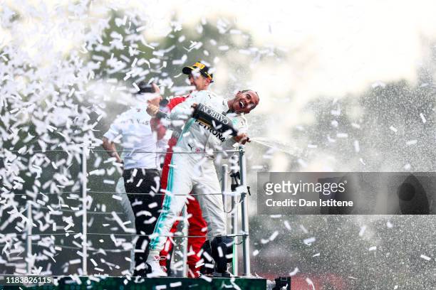 Race winner Lewis Hamilton of Great Britain and Mercedes GP celebrates on the podium during the F1 Grand Prix of Mexico at Autodromo Hermanos...