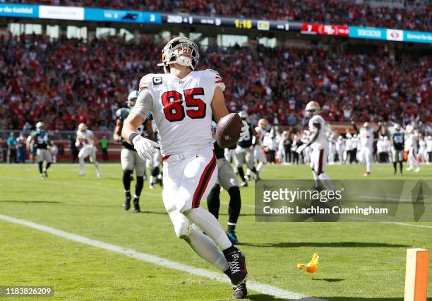 George Kittle of the San Francisco 49ers reacts in the end zone as a flag is thrown for a penalty against Deebo Samuel against Ross Cockrell of the...