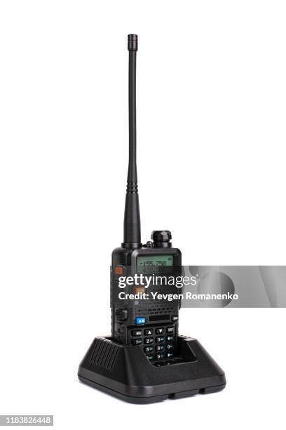portable radio transceiver in charging dock isolated on white background - portable radio stock pictures, royalty-free photos & images