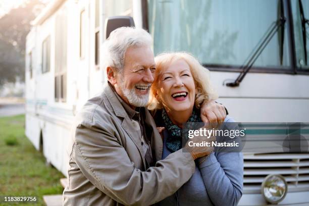 seniors and luxury motor home ,recreational vehicle - trailer imagens e fotografias de stock