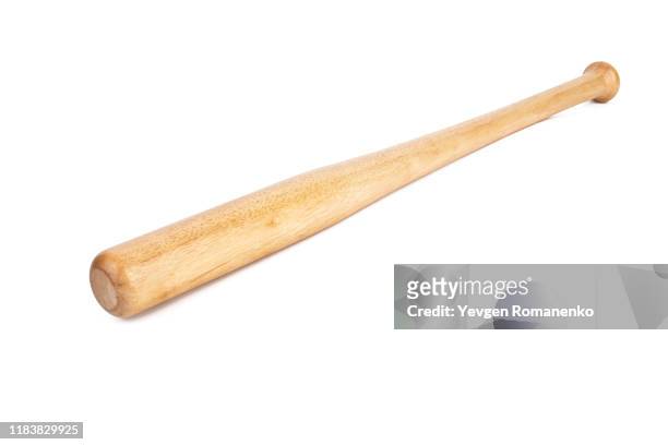 wooden baseball bat isolated on white background - baseball swing stock-fotos und bilder