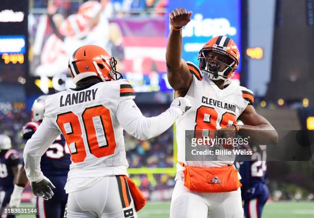 Tight end Demetrius Harris of the Cleveland Browns celebrates with wide receiver Jarvis Landry after scoring a touchdown in the second quarter of the...