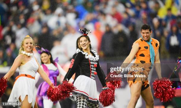 Cheerleaders in costume perform as the New England Patriots play against the Cleveland Browns at Gillette Stadium on October 27, 2019 in Foxborough,...