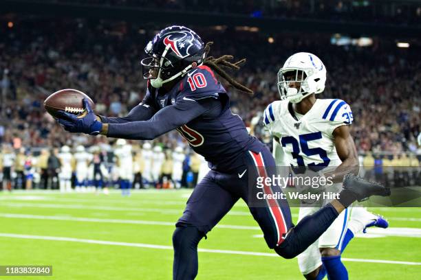 DeAndre Hopkins of the Houston Texans catches a pass for a touchdown during the second half of a game against the Indianapolis Colts at NRG Stadium...