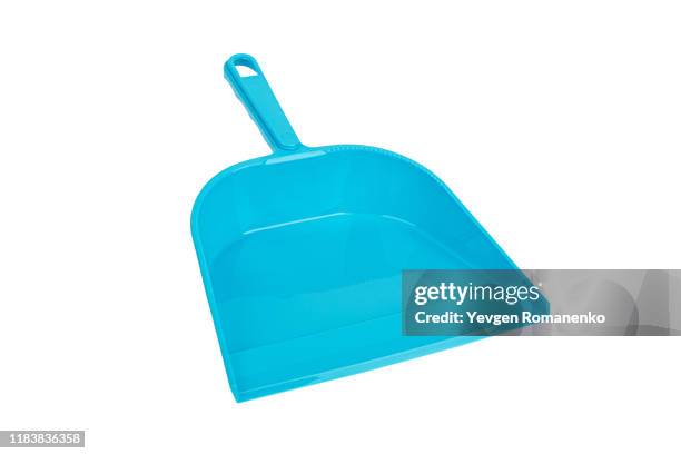 blue plastic dustpan isolated on white background - dustpan and brush stockfoto's en -beelden