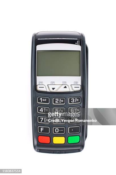 credit card pos terminal isolated on white background. close up of payment device, card machine. - poes stock-fotos und bilder
