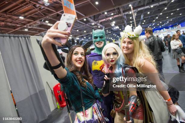 Cosplayer group take a selfie in character during day 3 of the October MCM London Comic Con 2019 at ExCel on October 27, 2019 in London, England.