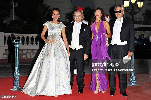 Umberto Tozzi and his wife with Andrea Bocelli and wife Veronica Berti attend a dinner at Opera terraces after their religious wedding ceremony on...