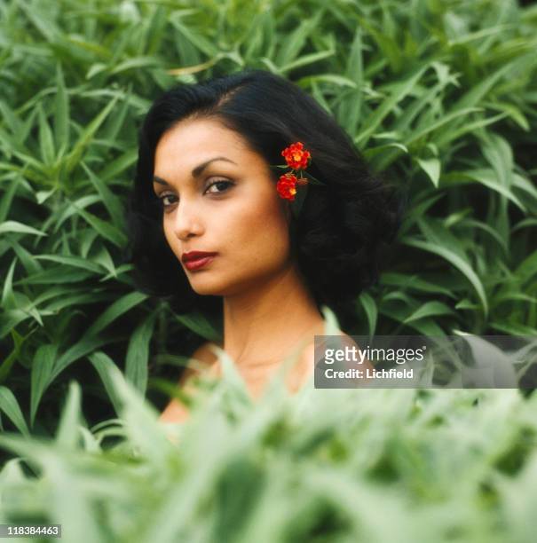 Shakira Caine, Guyana born model and actress, clothes and costume jewellery designer in the garden at home in Beverley Hills, USA , 8th October 1980.