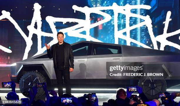 Tesla co-founder and CEO Elon Musk introduces the newly unveiled all-electric battery-powered Tesla Cybertruck at Tesla Design Center in Hawthorne,...