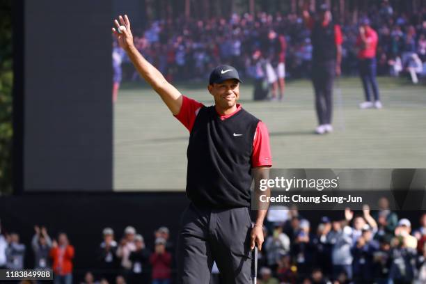 Tiger Woods of the United States celebrates winning the tournament on the 18th green during the final round of the Zozo Championship at Accordia Golf...