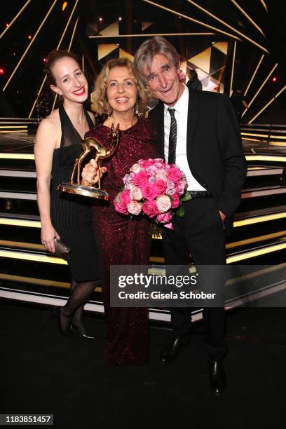 Daughter Lilian Schiffer, Michaela May with award and her husband Bernd Schadewald during the 71st Bambi Awards final applause at Festspielhaus...