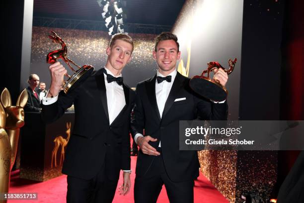 Swimmer Florian Wellbrock and Niklas Kaul with award during the 71th Bambi Awards winners board at Festspielhaus Baden-Baden on November 21, 2019 in...