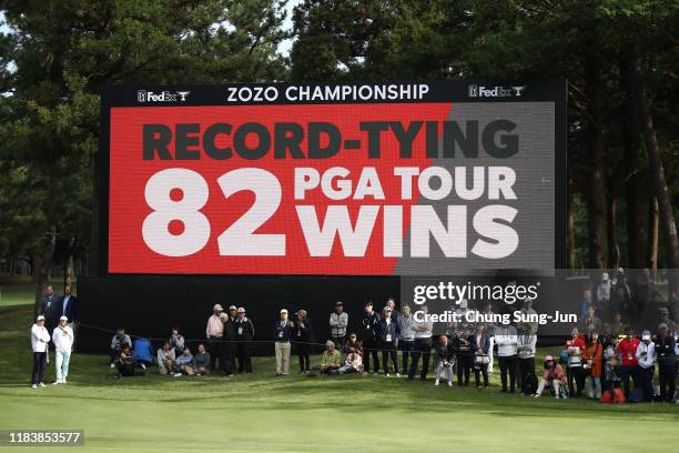 Monitor displays Tiger Woods of the United States achieved the 82nd carrier victory in the PGA Tour tying Sam Snead after the final round of the Zozo...