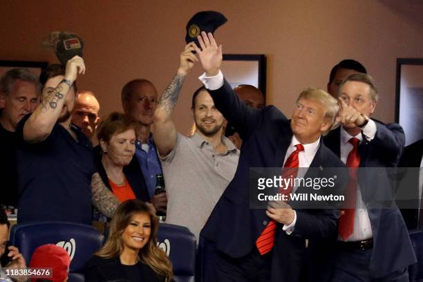 President Donald Trump attends Game Five of the 2019 World Series between the Houston Astros and the Washington Nationals at Nationals Park on...