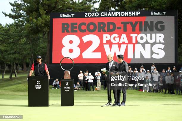 Tiger Woods of the United States speaks at the award ceremony following the final round of the Zozo Championship at Accordia Golf Narashino Country...