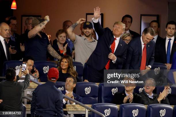 President Donald Trump attends Game Five of the 2019 World Series between the Houston Astros and the Washington Nationals at Nationals Park on...