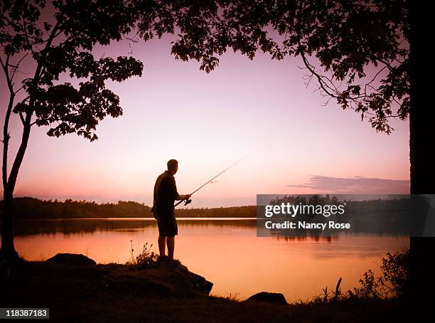fishing at sunset - halifax nova scotia stock-fotos und bilder