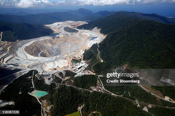 An aerial view shows an open pit at the Batu Hijau copper and gold mine operated by PT Newmont Nusa Tenggara in Sumbawa, West Nusa Tenggara province,...