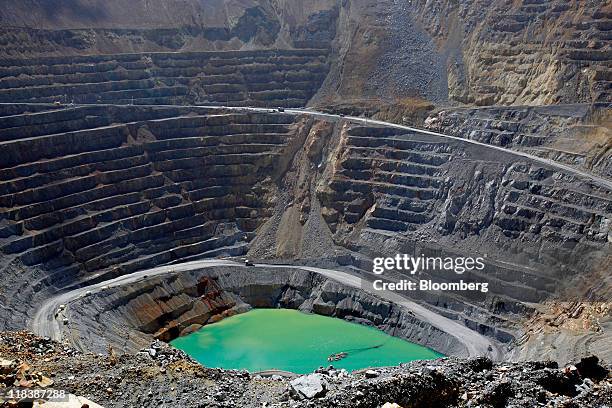 An open pit sits in the Batu Hijau copper and gold mine operated by PT Newmont Nusa Tenggara in Sumbawa, West Nusa Tenggara province, Indonesia, on...