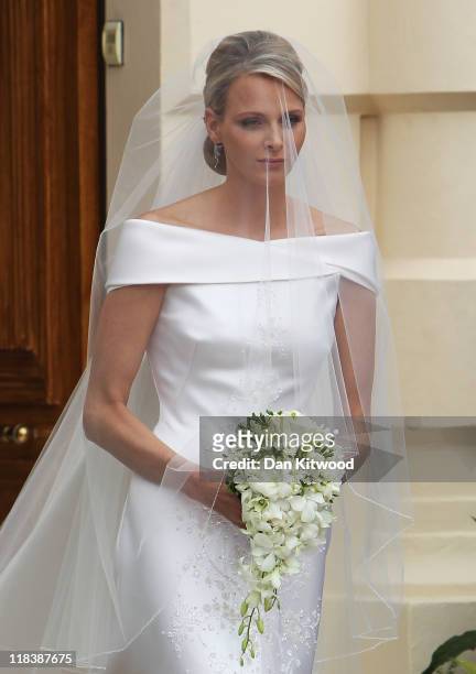 Princess Charlene of Monaco attends her religious ceremony of the Royal Wedding to husband Prince Albert II of Monaco in the main courtyard at the...