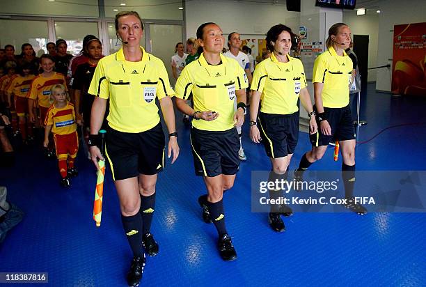 Referee Jenny Palmqvist of Sweden and assistants Helen Karo, Anna Nystrom and Jacqui Melksham prepare to lead Mexico and New Zealand onto the field...