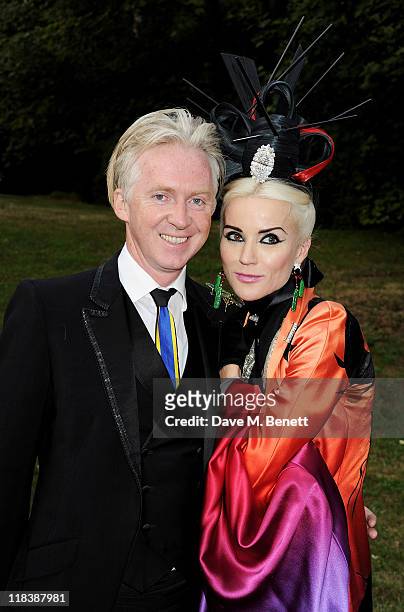 Philip Treacy and Daphne Guinness arrive at The White Fairy Tale Love Ball hosted by Valentino Garavani and Natalia Vodianova in aid of the Naked...