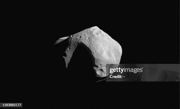 This image mosaic of asteroid 253 Mathilde releaseed by NASA 30 June is constructed from four images acquired by the NEAR spacecraft on 27 June. The...