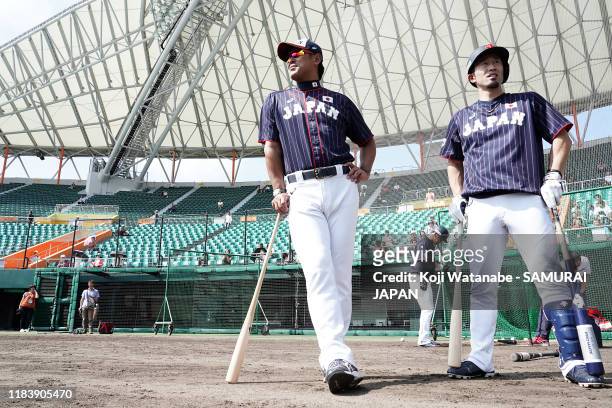 Manager Atsunori Inaba and Shuta Tonosaki look on during a Samurai Japan training session at the Okinawa Cellular Stadium Naha on October 28, 2019 in...