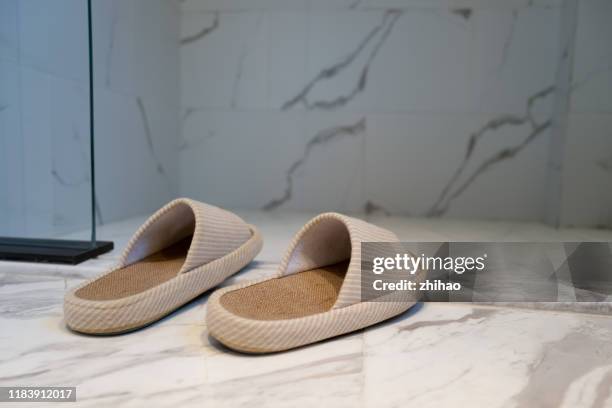 slippers at the door of the bathroom - chinelos imagens e fotografias de stock