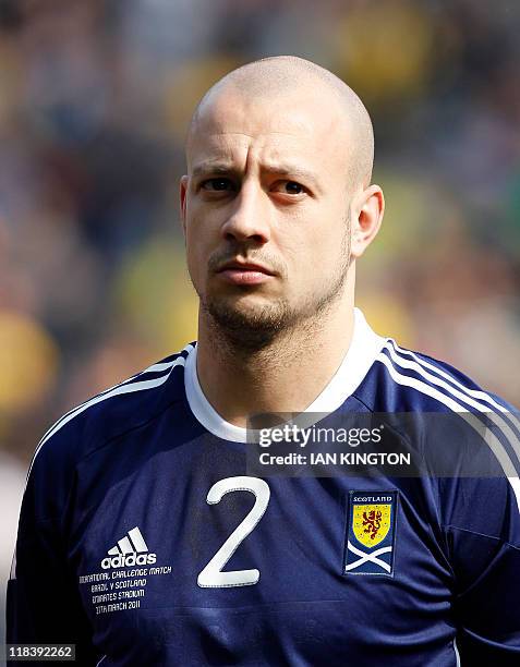 Scotland's Alan Hutton lines up for the National Anthems before kick off of their International friendly football match against Brazil, at the...