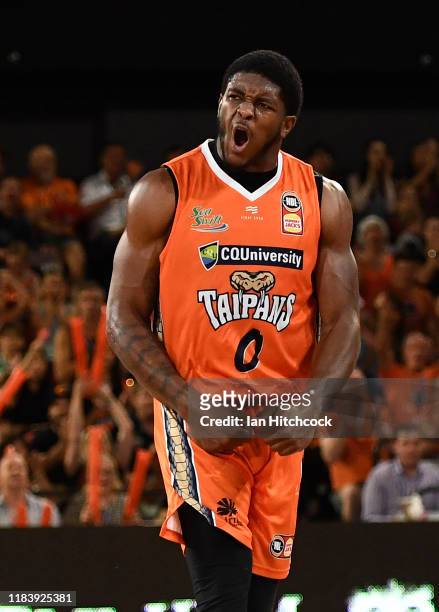 Cameron Oliver of the Taipans celebrates after scoring during the round four NBL match between the Cairns Taipans and Melbourne United at the Cairns...