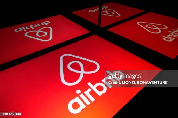 This illustration picture taken on November 22 shows the logo of the online lodging service Airbnb displayed on a tablet in Paris.