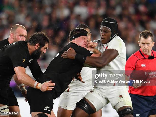 New Zealand's Scott Barrett is tackled by England's Maro Itoje during the Rugby World Cup 2019 Semi-Final match between England and New Zealand at...