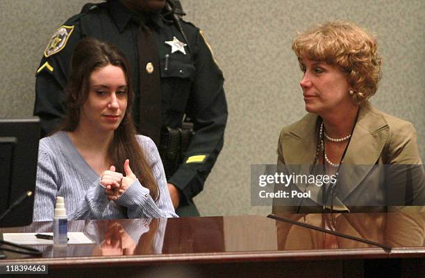 Casey Anthony sits with her attorney Dorothy Clay Sims during her sentencing hearing on charges of lying to a law enforcement officer at the Orange...