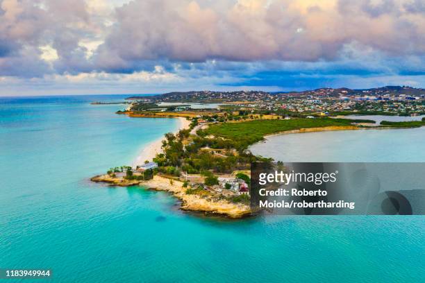 aerial view by drone of fort james surrounded by caribbean sea, st. john's, antigua, leeward islands, west indies, caribbean, central america - antigua stock-fotos und bilder