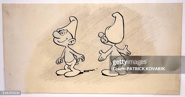 Drawing depicting a Smurf is displayed during an exhibition entitled "Pierre Culliford, PEYO, the life and and work of a master story-teller" at the...