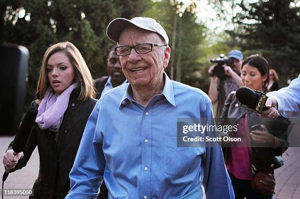 Rupert Murdoch, Chairman and CEO of News Corporation, is surrounded by media as he arrives at the Allen & Company Sun Valley Conference on July 7,...