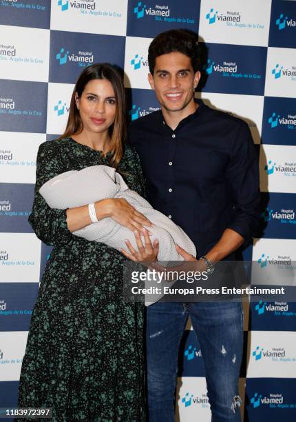 Marc Bartra and Melissa Jimenez present their new-born son Max on October 28, 2019 in Seville, Spain.