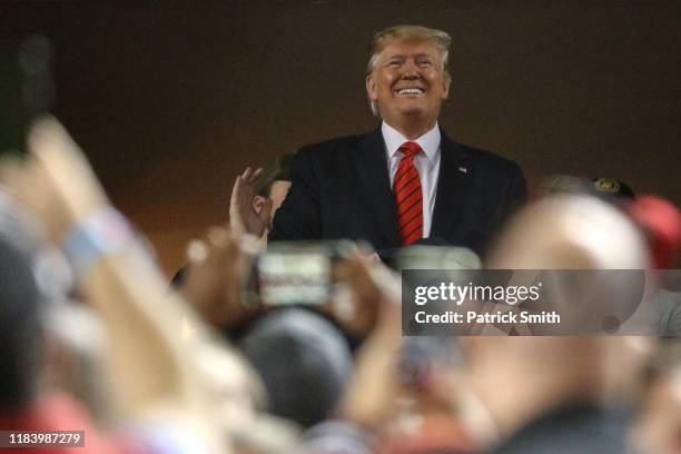 President Donald Trump attends Game Five of the 2019 World Series between the Houston Astros and the Washington Nationals at Nationals Park on...