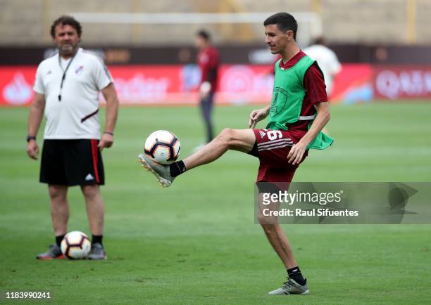 Ignacio Fernandez of River Plate kicks the ball during a training session on the day before the Copa Libertadores 2019 Final at Estadio Monumental on...