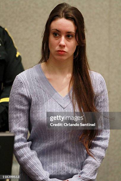 Casey Anthony stands as the judge enters court at the start of her sentencing hearing at the Orange County Courthouse in Orlando, Florida, Thursday,...