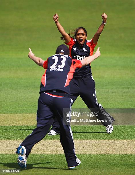 Isa Guha of England celebrates her hundredth wicket, after she bowled Alex Blackwell of Australia during the NatWest Women's Quadrangular Series...