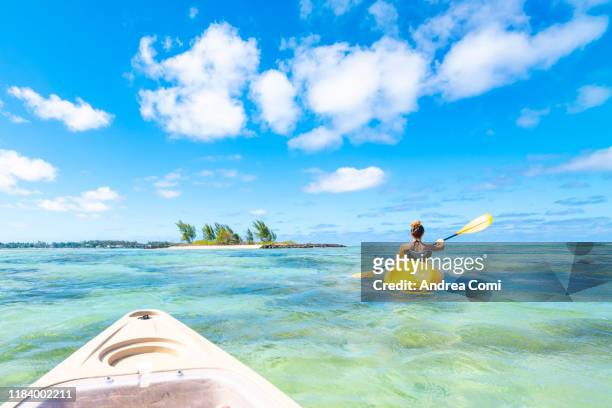personal perspective of a person canoeing - mauritius bildbanksfoton och bilder